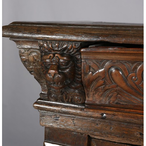 425 - A 19TH CENTURY CONTINENTAL OAK CUPBOARD, having a moulded and writhen lobe carved cornice fitted wit... 