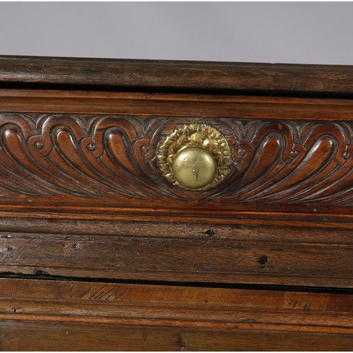 425 - A 19TH CENTURY CONTINENTAL OAK CUPBOARD, having a moulded and writhen lobe carved cornice fitted wit... 