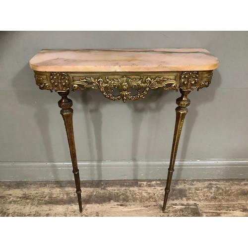 409 - A gilt metal ornate console table with heavily carved and moulded front, with marble top, 72cm wide