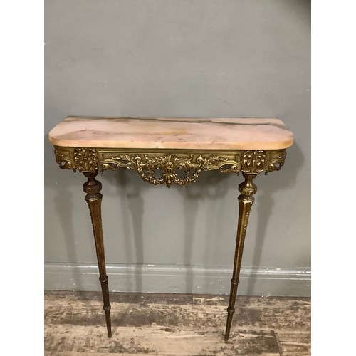 409 - A gilt metal ornate console table with heavily carved and moulded front, with marble top, 72cm wide