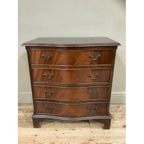 415 - A mahogany reproduction serpentine fronted chest of four drawers on bracket feet, 70cm wide