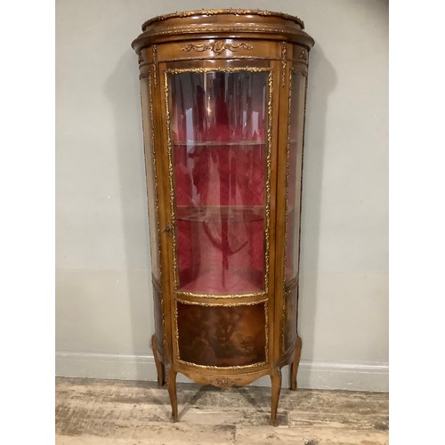 423 - A reproduction walnut and gilt metal mounted vitrine with three glazed panels over romantic scenes, ... 