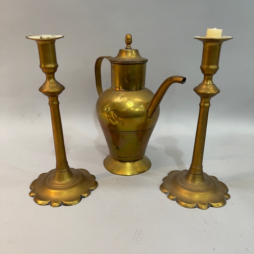 200 - A pair of 18th century brass candlesticks on circular dimed base with petallated rim 26.5cm high, an... 