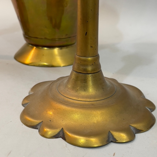 200 - A pair of 18th century brass candlesticks on circular dimed base with petallated rim 26.5cm high, an... 