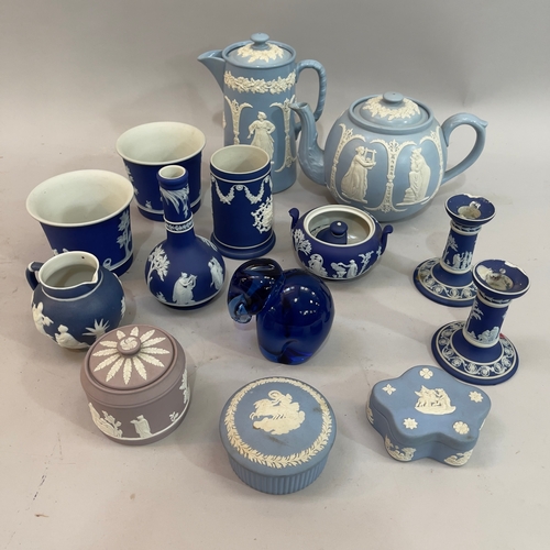 219 - A collection of Wedgwood Jasperware including a lilac dish and cover, a dark blue bottle neck vase, ... 