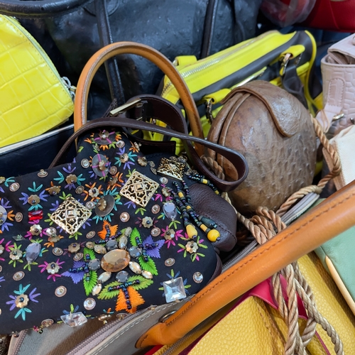 242 - An Elizabeth Arden red handbag, a Radley yellow leather round handbag with shoulder strap, a mustard... 