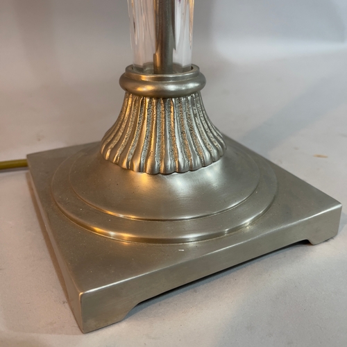 256 - A pewter-coloured metal and fluted glass, column table lamp on square base, 79cm high overall