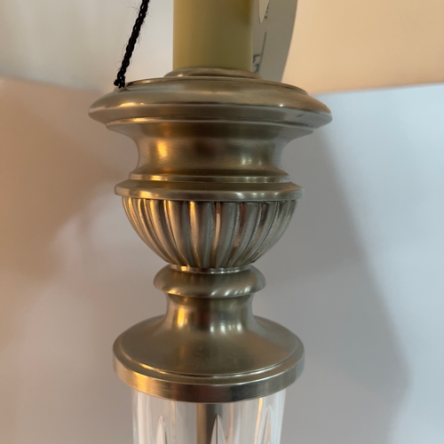 256 - A pewter-coloured metal and fluted glass, column table lamp on square base, 79cm high overall