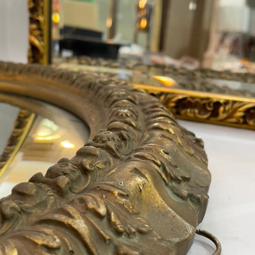 272 - Convex wall mirror in gilt plaster leaf-moulded frame 55cm diameter together with a gilt rectangular... 