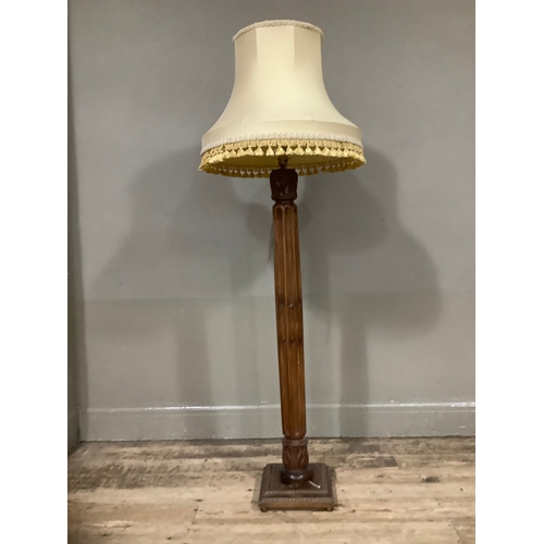 296 - A carved mahogany standard lamp, 110cm high