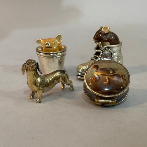 343 - A white metal and enamelled pig in a bucket 3cm, a mouse in a boat 3.75cm, a pill box circular ename... 