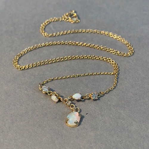 382 - An opal and diamond necklace, the oval and circular cabochon opals, brilliant cut diamonds all claw ... 