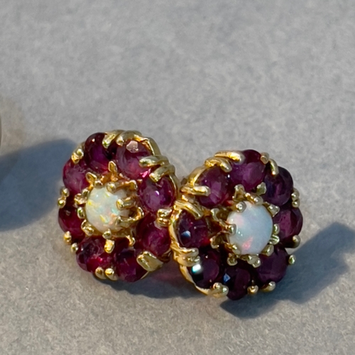 383 - Four pairs of stud earrings all in 9ct gold variously set with fresh water cultured pearls, ruby, op... 