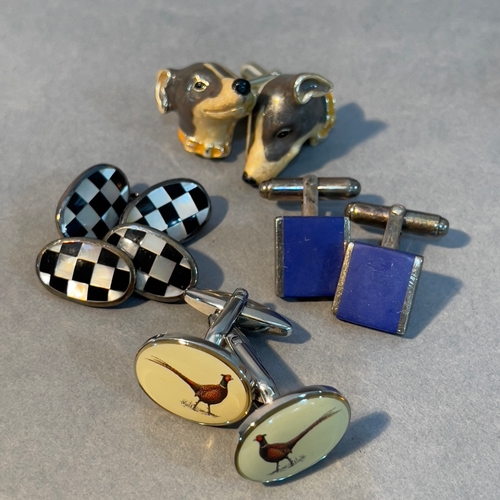 395 - Three pairs of silver cufflinks variously set with enamel, lapis lazuli, onyx and mother of pearl, T... 