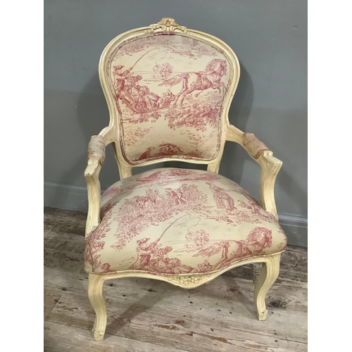 430 - A French style cream painted armchair with carved flower pediment, on cabriole legs in oatmeal and p... 