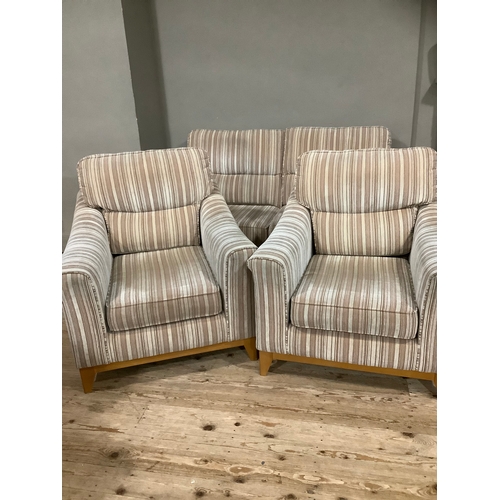 431 - A Parker Knoll beige and brown striped three piece suite comprising two seater sofa and two armchair... 