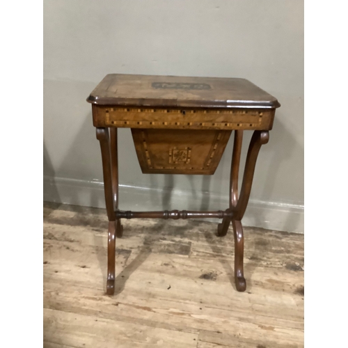 435 - A Victorian walnut and mahogany satinwood and ebony inlaid work box having hinged top, fitted interi... 