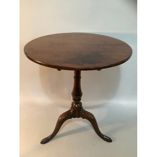 450 - A 19th century mahogany tilt top tripod table measuring 63cm wide