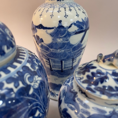 79 - A Chinese porcelain blue and white vase of baluster form painted with a pagoda in a landscape with a... 