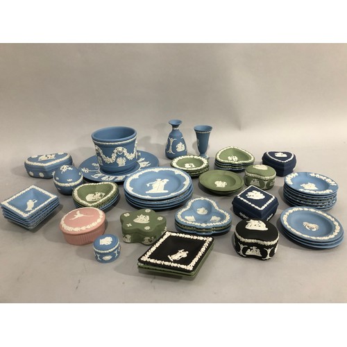 22 - A collection of Wedgwood Jasper ware, including a black trinket box and lozenge shaped pin dish, a p... 