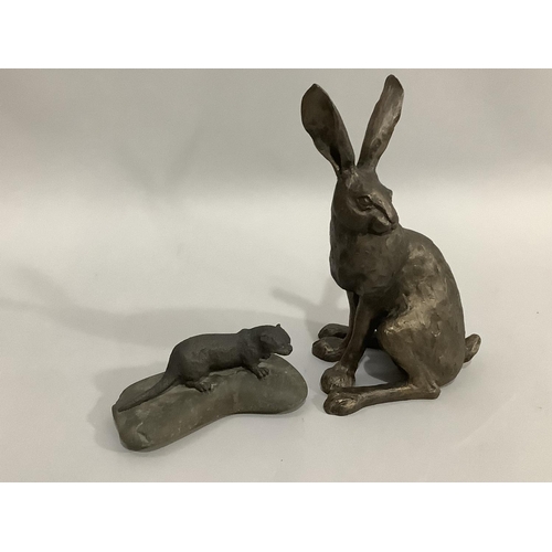 12 - A bronze effect hare by Frith Sculpture, 29cm, together with a model of an otter upon a rock, 17.5cm... 