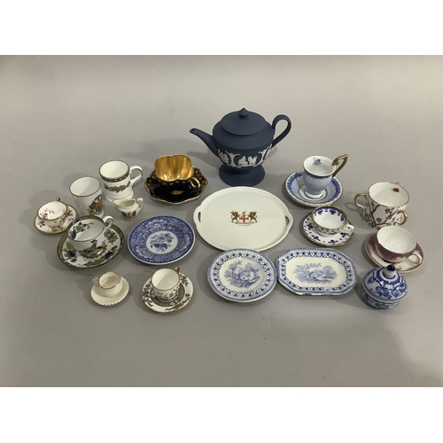 125 - A collection of cabinet and miniature cups and saucers, blue and white dolls tea ware, Wedgwood Jasp... 