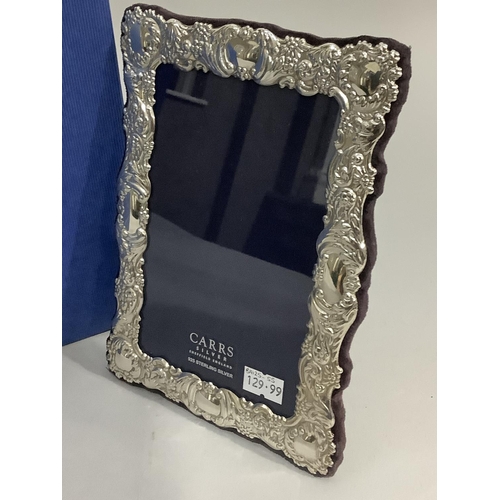 172 - A modern sterling silver photograph frame of embossed design by Carrs of Sheffield, boxed, as new, 1... 