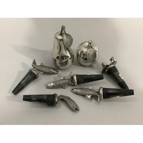 136 - A set of five pewter fish mounted bottle stoppers and another with two frog finial, a polished pewte... 