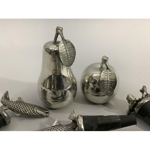 136 - A set of five pewter fish mounted bottle stoppers and another with two frog finial, a polished pewte... 