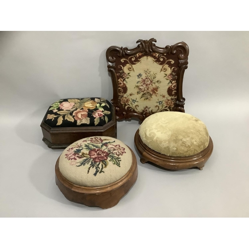 146 - Two Victorian walnut footstools of circular outline with needlework and upholstered tops together wi... 