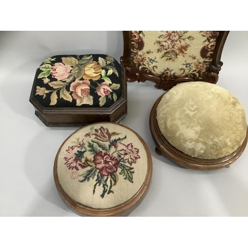 146 - Two Victorian walnut footstools of circular outline with needlework and upholstered tops together wi... 