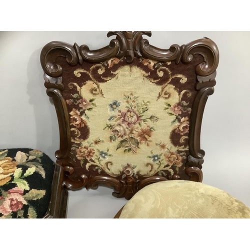 146 - Two Victorian walnut footstools of circular outline with needlework and upholstered tops together wi... 