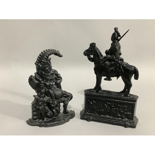 59 - Two cast iron doorstops in the form of Punch and  the other in the form of a cavalry officer on a  p... 