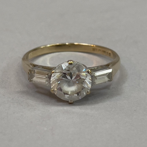 218 - A Cubic Zirconia three stone ring in 9ct. gold approx weight 2g