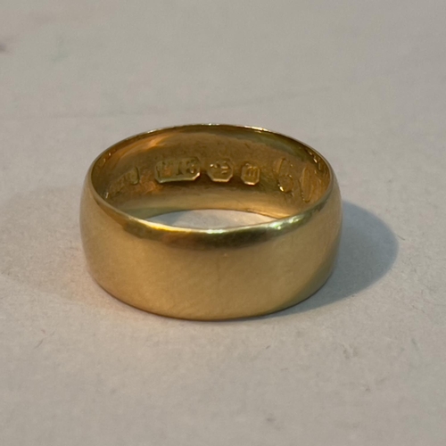 215 - A Victorian 18ct. gold wedding ring, engraved to the inside “God Abide, Grant Us Thy Love” in Gothic... 