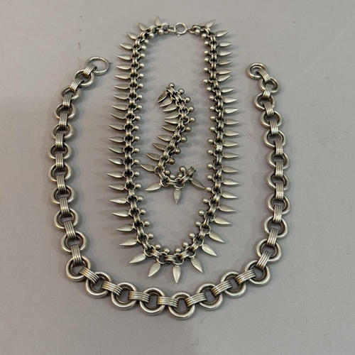 201 - A Victorian festoon silver necklace of pierced star, bead and pear drop links A/F together with a la... 