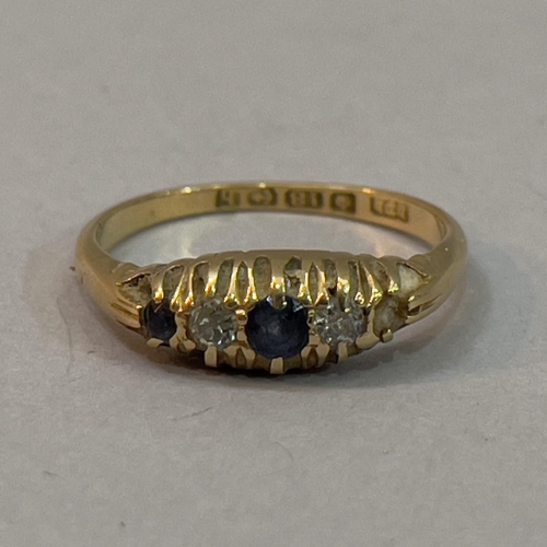 197 - A George V sapphire and diamond five stone ring in 18ct gold (at fault - one sapphire missing), appr... 