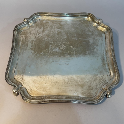 166 - A Geroge V silver tray Sheffield 1937 for Frank Cobb Ltd, of square outline with bracelet scolloped ... 