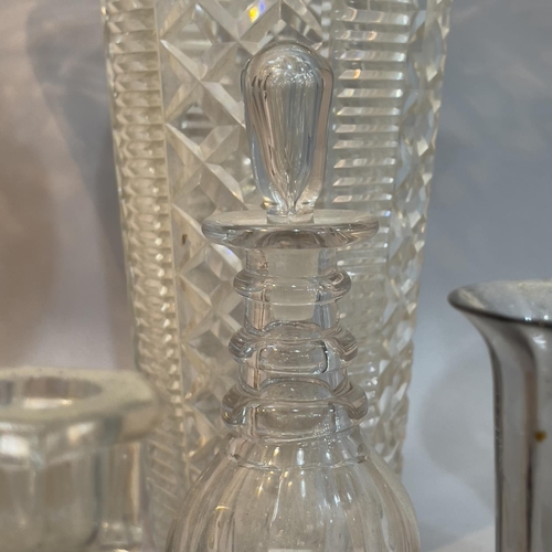 94 - Two cut glass vases 33cm high, two further glass vases of wrythen form, a small decanter and stopper... 