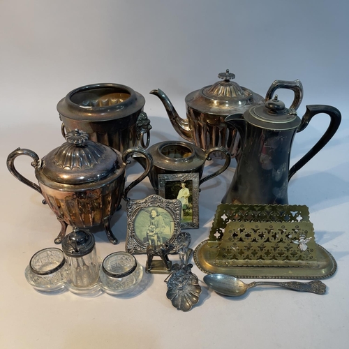 104 - A silver plated tea service comprising teapot, hot water pot, milk jug and cachepot having fluted bo... 