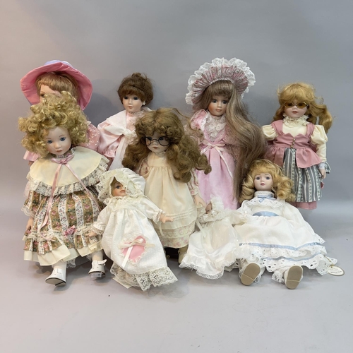 66 - Nine soft bodied dolls with bisque heads including two Alberon examples