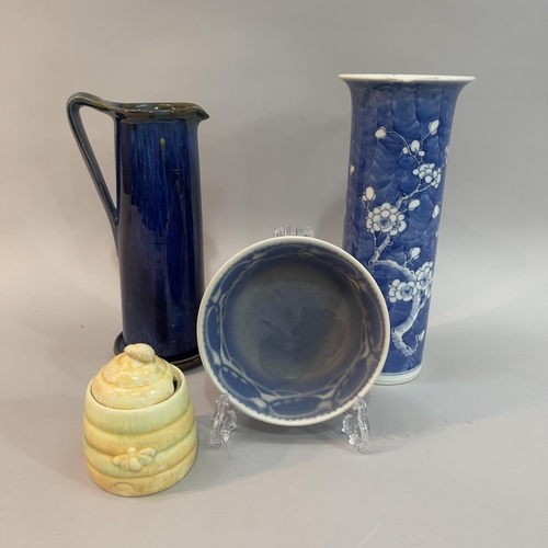 32 - A Bourne Denby blue and brown glazed cylindrical jug 23.5cm high, a Chinese blue and white sleeve va... 