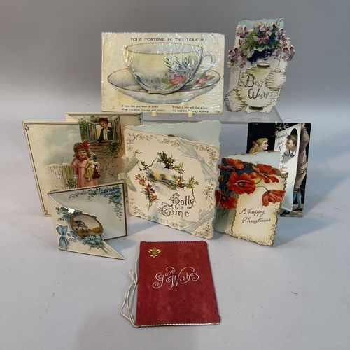 5 - A small collection of Victorian and later greeting cards including a Christmas card in the form of a... 