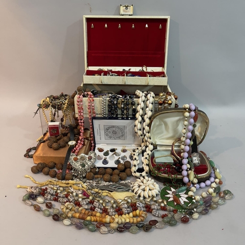 192 - A collection of costume jewellery including necklaces, lady's wristwatches, brooches, earrings and r... 