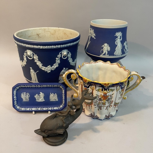 107 - A jasperware jardiniere applied with classical figures, grape vine swags and lion masks with repaire... 