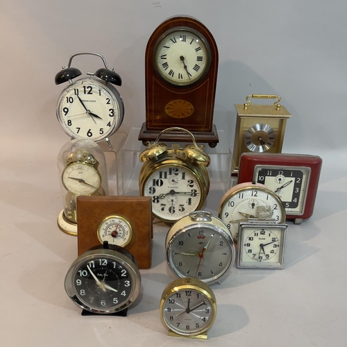 90 - An inlaid Edwardian mantel clock together with a quantity of other later clocks