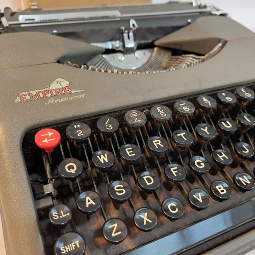 101 - An Empire portable typewriter and a WWII children's gas mask with address in Liverpool to Wales