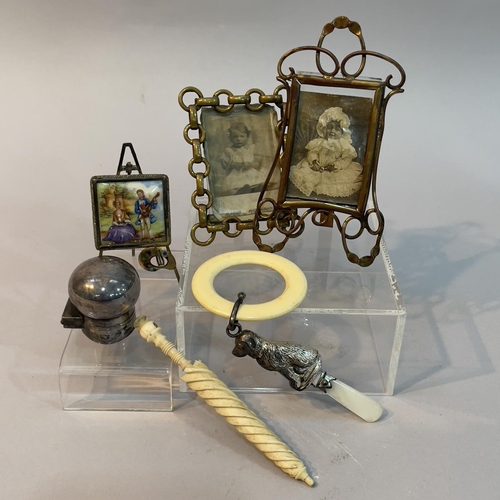 186 - A bone snuff bottle and stanhope in the shape of an umbrella  A/F, two miniature gilt photo frames, ... 