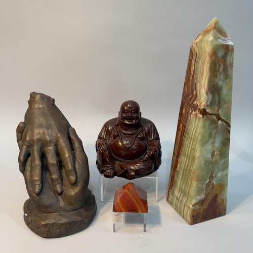 36 - A bronzed plaster model of two hands touching marked KAR to verso, an onyx obelisk, a small carnelia... 