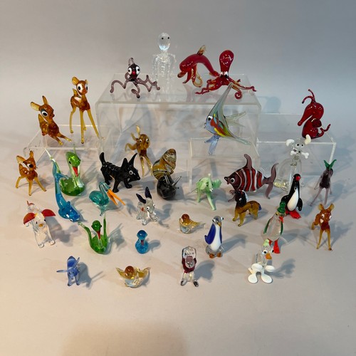 114 - A collection of Murano glass animals including a snail, penguin, Scottie dog, fish, octopus etc. (33... 